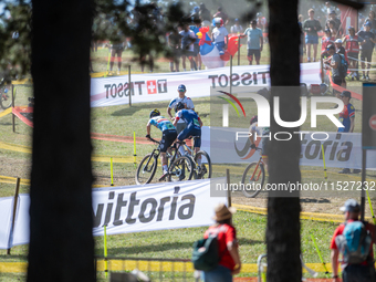 Cyclists participate in the UCI Mountain Bike World Championships CROSS-COUNTRY OLYMPIC MEN JUNIOR in Pal Arinsal, Andorra, on August 30, 20...