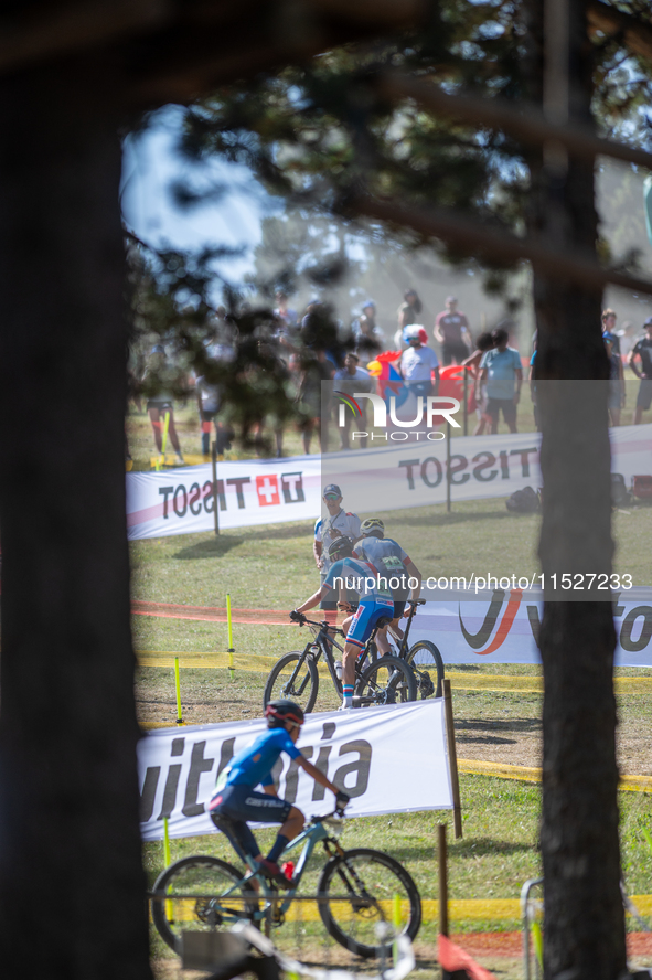 Cyclists participate in the UCI Mountain Bike World Championships CROSS-COUNTRY OLYMPIC MEN JUNIOR in Pal Arinsal, Andorra, on August 30, 20...