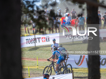 Cyclists participate in the UCI Mountain Bike World Championships CROSS-COUNTRY OLYMPIC MEN JUNIOR in Pal Arinsal, Andorra, on August 30, 20...