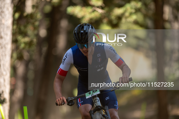 Lee Kalanquin of France participates in the UCI Mountain Bike World Championships Cross-Country Olympic Men Junior in Pal Arinsal, Andorra,...