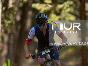 Lee Kalanquin of France participates in the UCI Mountain Bike World Championships Cross-Country Olympic Men Junior in Pal Arinsal, Andorra,...