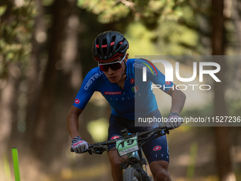 Ryan Peruzzo of Italy competes in the UCI Mountain Bike World Championships Cross-Country Olympic Men Junior in Pal Arinsal, Andorra, on Aug...