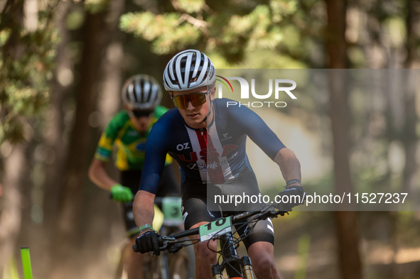 Roger Coote of the USA participates in the UCI Mountain Bike World Championships Cross-Country Olympic Men Junior in Pal Arinsal, Andorra, o...