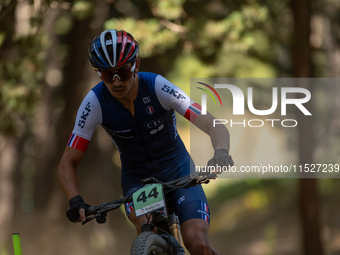 Brent Martino of France competes in the UCI Mountain Bike World Championships Cross-Country Olympic Men Junior in Pal Arinsal, Andorra, on A...