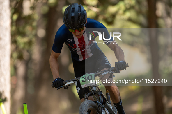 Mattia Valdez of the USA participates in the UCI Mountain Bike World Championships Cross-Country Olympic Men Junior in Pal Arinsal, Andorra,...