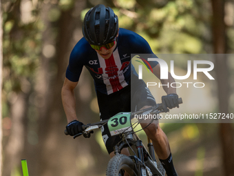 Mattia Valdez of the USA participates in the UCI Mountain Bike World Championships Cross-Country Olympic Men Junior in Pal Arinsal, Andorra,...