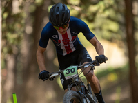 Mattia Valdez of the USA participates in the UCI Mountain Bike World Championships Cross-Country Olympic Men Junior in Pal Arinsal, Andorra,...