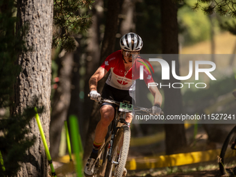 Zsombor Gauthier of Canada competes in the UCI Mountain Bike World Championships Cross-Country Olympic Men Junior in Pal Arinsal, Andorra, o...