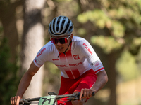 Filip Polchlopek of Poland competes in the UCI Mountain Bike World Championships Cross-Country Olympic Men Junior in Pal Arinsal, Andorra, o...