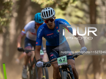 Guillermo Rial of Italy participates in the UCI Mountain Bike World Championships Cross-Country Olympic Men Junior in Pal Arinsal, Andorra,...