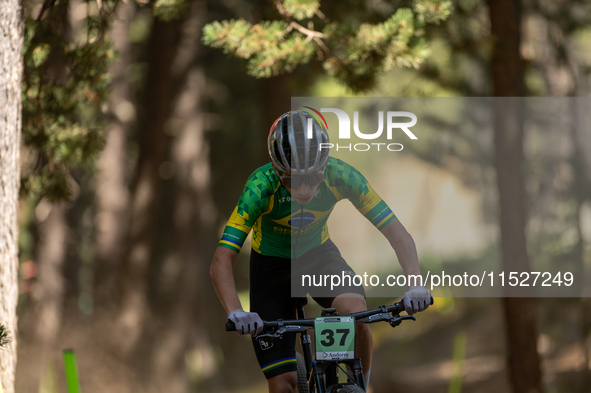 Dragos De Souza of Gustavo competes in the UCI Mountain Bike World Championships Cross-Country Olympic Men Junior in Pal Arinsal, Andorra, o...