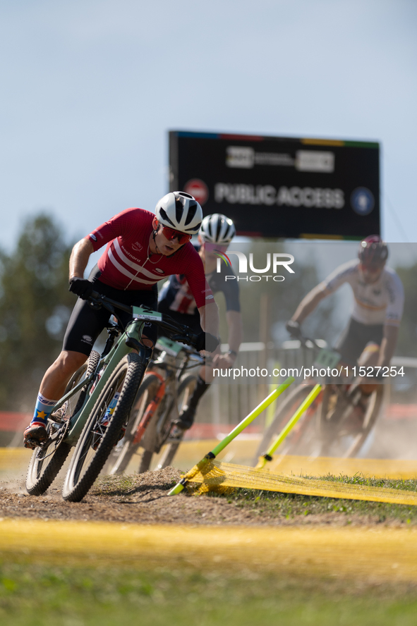 Cyclists participate in the UCI Mountain Bike World Championships CROSS-COUNTRY OLYMPIC MEN JUNIOR in Pal Arinsal, Andorra, on August 30, 20...