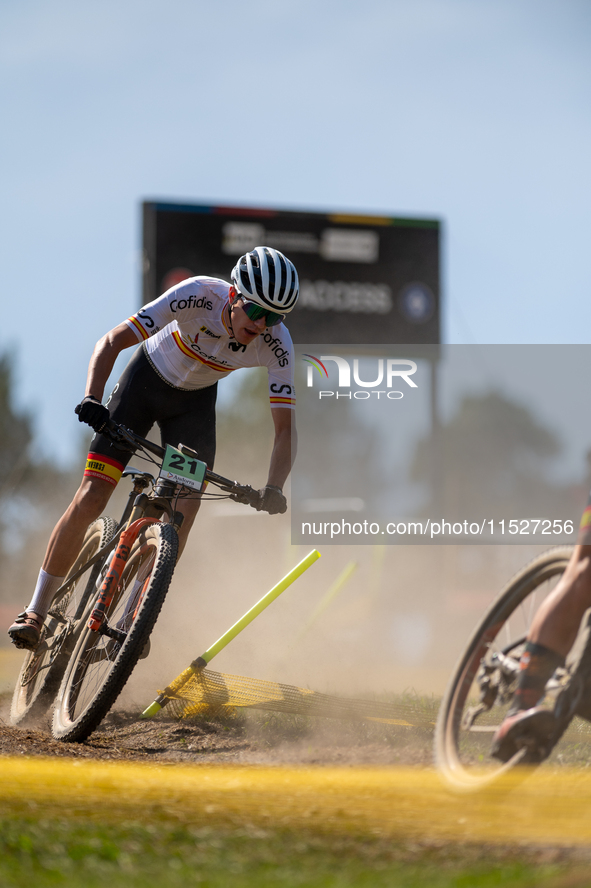 Alberto Garcia of Spain participates in the UCI Mountain Bike World Championships Cross-Country Olympic Men Junior in Pal Arinsal, Andorra,...