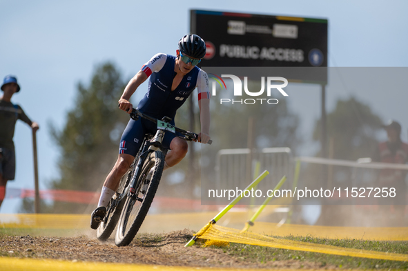 Lee Kalanquin of France participates in the UCI Mountain Bike World Championships Cross-Country Olympic Men Junior in Pal Arinsal, Andorra,...