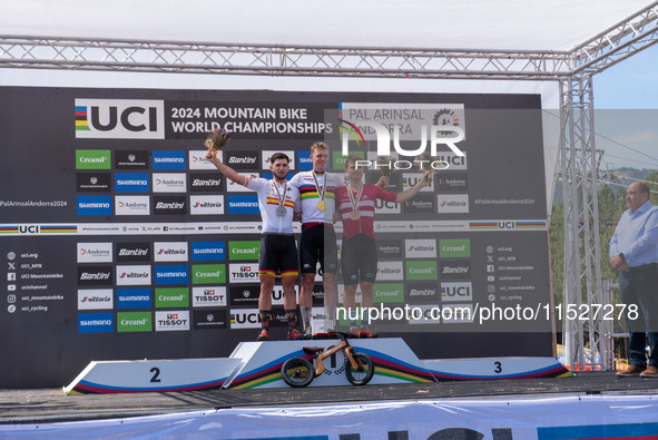 In Pal Arinsal, Andorra, on August 30, 2024, Nicolas Philipsen of Denmark, Nicolas Franco of Spain, and Henrique Hougs of Denmark celebrate...