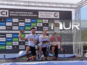 In Pal Arinsal, Andorra, on August 30, 2024, Nicolas Philipsen of Denmark, Nicolas Franco of Spain, and Henrique Hougs of Denmark celebrate...