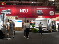 Visitors check the Dethleffs camping vans at the Duesseldorf Trade Fair Center during the Caravan Salon, the leading motorhome and camping v...