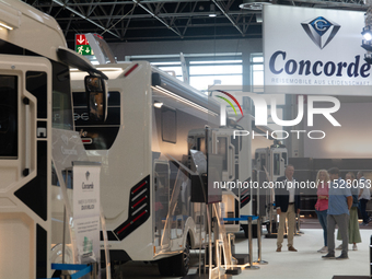 Visitors check the Concorde motorhome at the Duesseldorf Trade Fair Center during the Caravan Salon, the leading motorhome and camping van t...