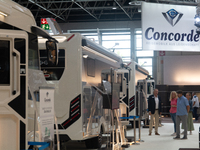 Visitors check the Concorde motorhome at the Duesseldorf Trade Fair Center during the Caravan Salon, the leading motorhome and camping van t...