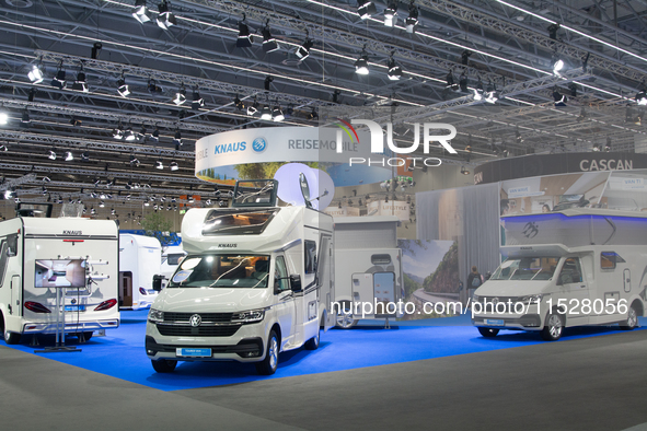 Visitors check the Knaus camping vans at the Duesseldorf Trade Fair Center during the Caravan Salon, the leading motorhome and camping van t...