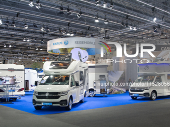 Visitors check the Knaus camping vans at the Duesseldorf Trade Fair Center during the Caravan Salon, the leading motorhome and camping van t...