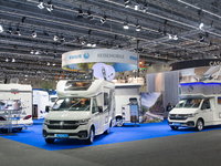 Visitors check the Knaus camping vans at the Duesseldorf Trade Fair Center during the Caravan Salon, the leading motorhome and camping van t...