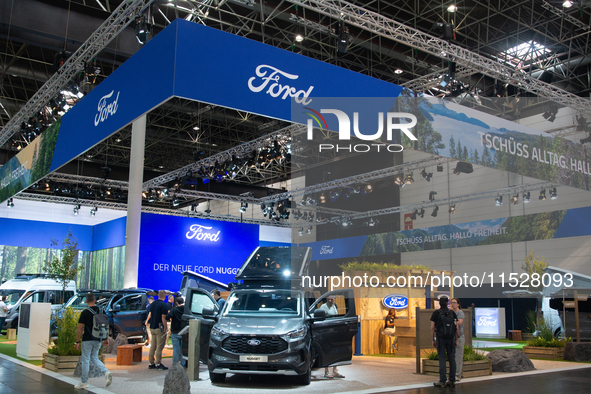 Visitors check Ford camping vans at the Duesseldorf Trade Fair Center during the Caravan Salon, the leading motorhome and camping van trade...