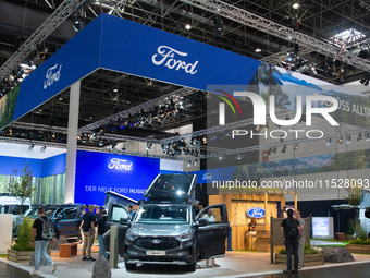 Visitors check Ford camping vans at the Duesseldorf Trade Fair Center during the Caravan Salon, the leading motorhome and camping van trade...