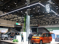 Visitors check Volkswagen camping vans at the Duesseldorf Trade Fair Center during the Caravan Salon, the leading motorhome and camping van...