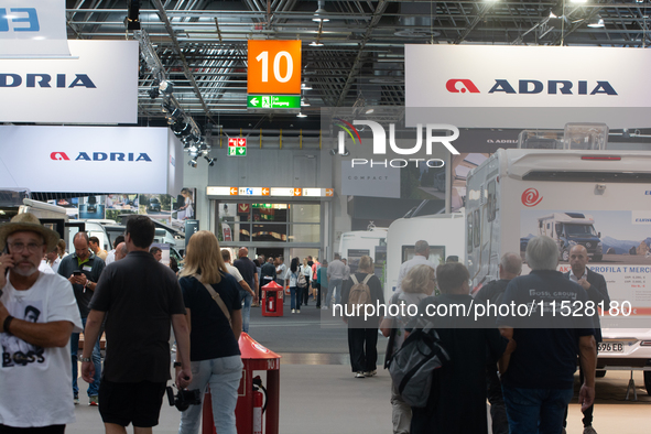 Visitors check Adria camping vans at the Duesseldorf trade fair center during the Caravan Salon, the leading motorhome and camping van trade...