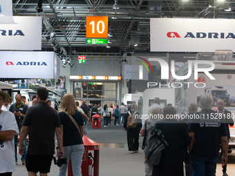 Visitors check Adria camping vans at the Duesseldorf trade fair center during the Caravan Salon, the leading motorhome and camping van trade...