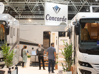 Visitors check the Concorde motorhome at the Duesseldorf Trade Fair Center during the Caravan Salon, the leading motorhome and camping van t...