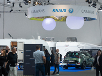 Visitors check Knaus camping vans at the Dusseldorf Trade Fair Center during the Caravan Salon, the leading motorhome and camping van trade...