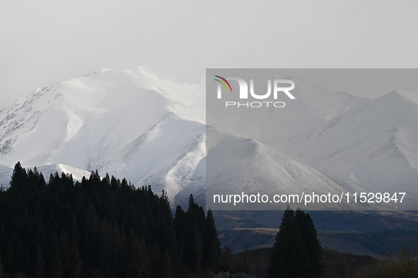 A general view of snow-covered mountains in Twizel, New Zealand, on August 30, 2024. 