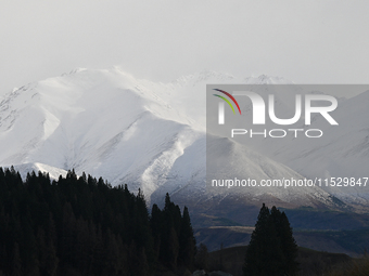 A general view of snow-covered mountains in Twizel, New Zealand, on August 30, 2024. (