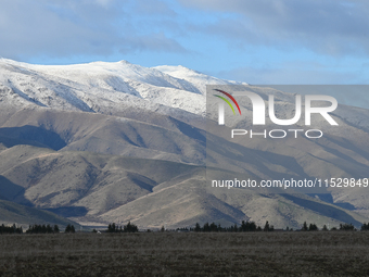 A general view of snow-covered mountains in Twizel, New Zealand, on August 30, 2024. (