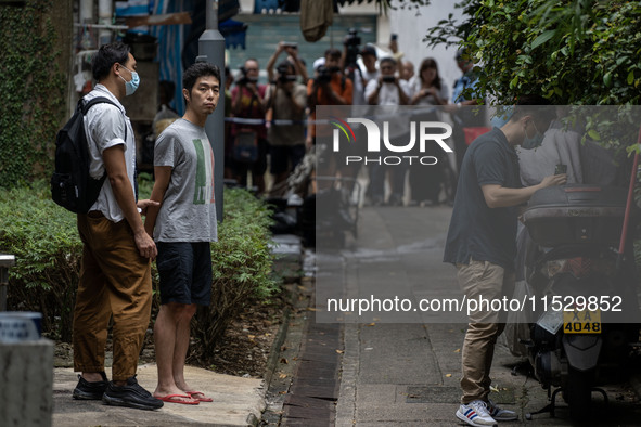 A man arrested by the National Security Police is seen during a police evidence gathering operation in Hong Kong, China, on August 31, 2024....