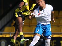 Theo Vassell of Barrow wins a header during the Sky Bet Championship match between  Harrogate and Barrow, in Harrogate, United Kingdom, on A...