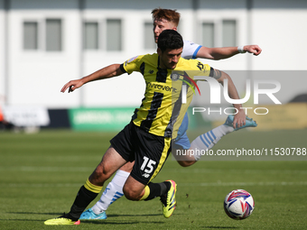 Harrogate Town's Anthony O'Connor turns against Barrow's Ged Garner during the Sky Bet Championship match between  Harrogate and Barrow, in...