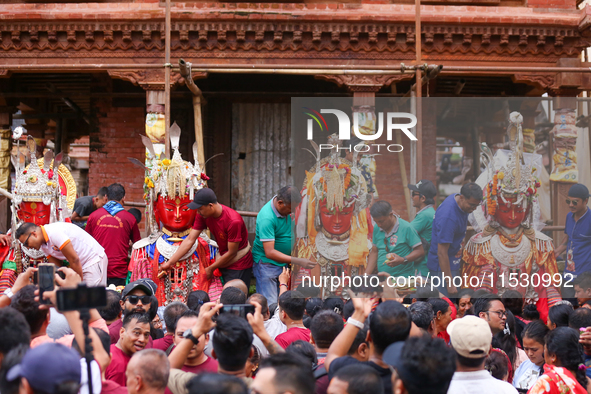 Nepali devotees carry the statues of Dipankar Buddha through the ancient city of Bhaktapur in Bhaktapur, Nepal, on August 31, 2024, during t...