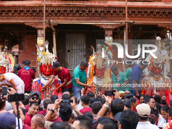 Nepali devotees carry the statues of Dipankar Buddha through the ancient city of Bhaktapur in Bhaktapur, Nepal, on August 31, 2024, during t...