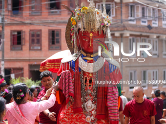 Nepali devotees carry the statues of Dipankar Buddha during the Panchadan festival in Bhaktapur, Nepal, on August 31, 2024. On this day, Bud...