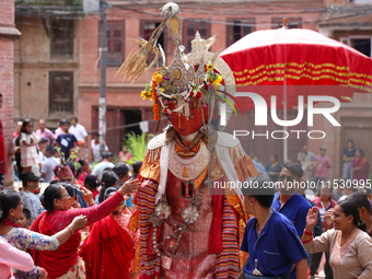 Nepali devotees worship the statues of Dipankar Buddha during the Panchadan festival in Bhaktapur, Nepal, on August 31, 2024. On this day, B...