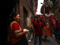 A Nepali devotee worships the statues of Dipankar Buddha during the Panchadan festival in Bhaktapur, Nepal, on August 31, 2024. On this day,...