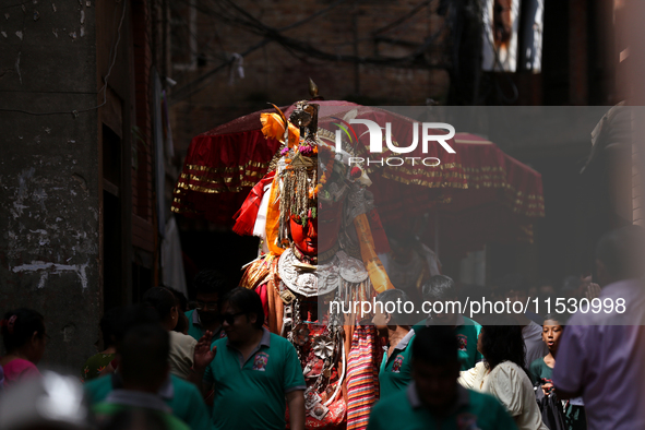 Nepali devotees carry the statues of Dipankar Buddha during the Panchadan festival in Bhaktapur, Nepal, on August 31, 2024. On this day, Bud...