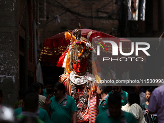 Nepali devotees carry the statues of Dipankar Buddha during the Panchadan festival in Bhaktapur, Nepal, on August 31, 2024. On this day, Bud...