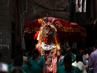 Nepali devotees carry the statues of Dipankar Buddha during the Panchadan festival in Bhaktapur, Nepal, on August 31, 2024. On this day, Bud...