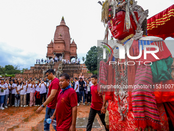 Nepali devotees carry the statues of Dipankar Buddha through the ancient city of Bhaktapur in Bhaktapur, Nepal, on August 31, 2024, during t...