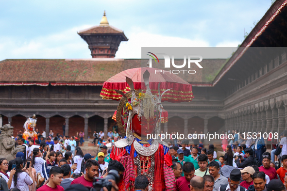 Nepali devotees carry the statues of Dipankar Buddha through the ancient city of Bhaktapur in Bhaktapur, Nepal, on August 31, 2024, during t...