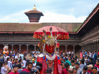 Nepali devotees carry the statues of Dipankar Buddha through the ancient city of Bhaktapur in Bhaktapur, Nepal, on August 31, 2024, during t...